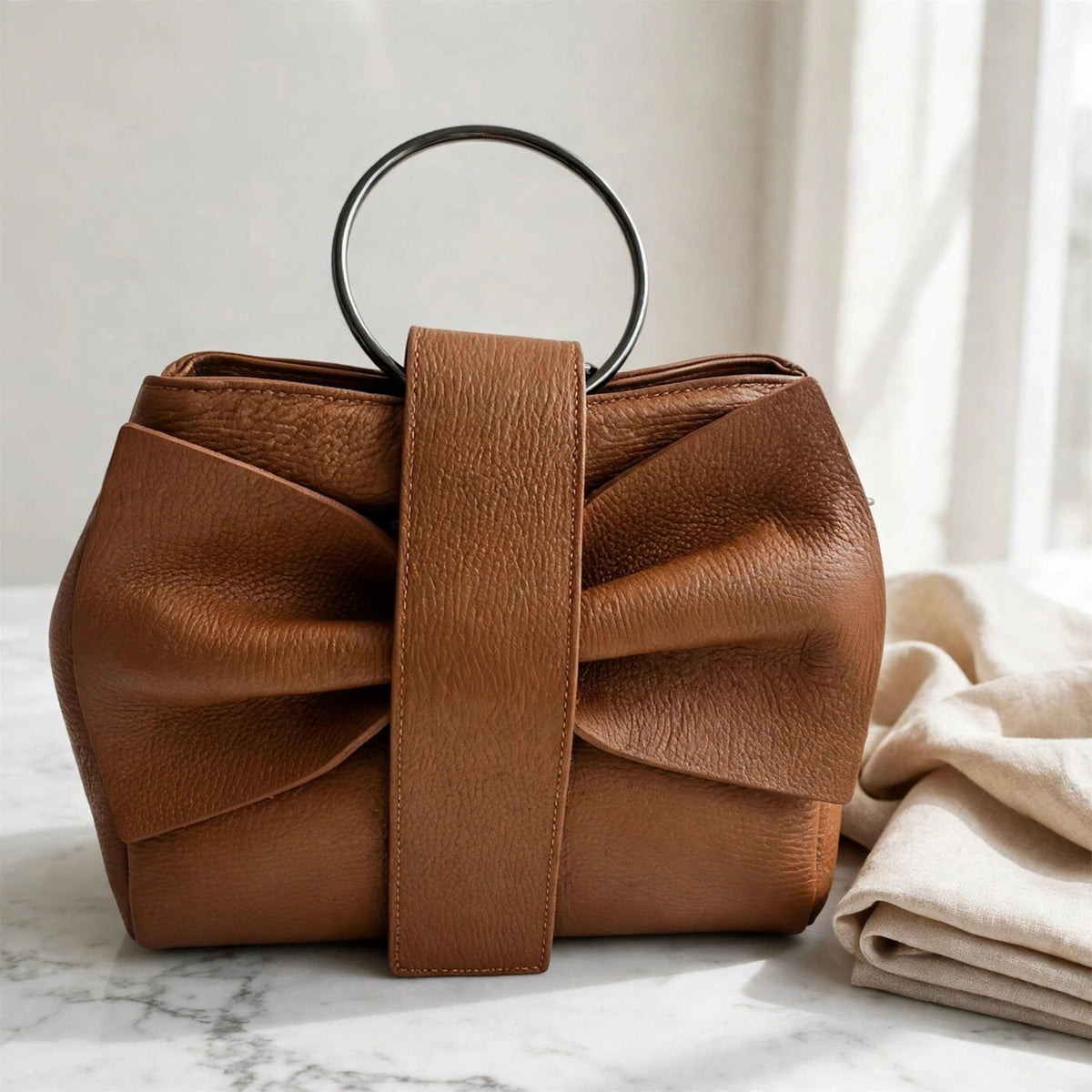 Bow in genuine Italian leather